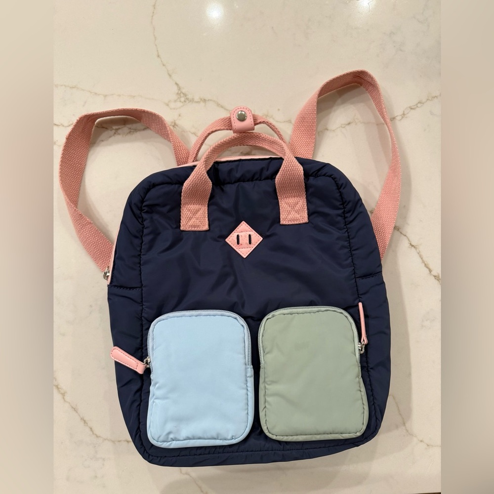 Kids Multi-Color Casual Backpack bag in pink, with blue and green accents